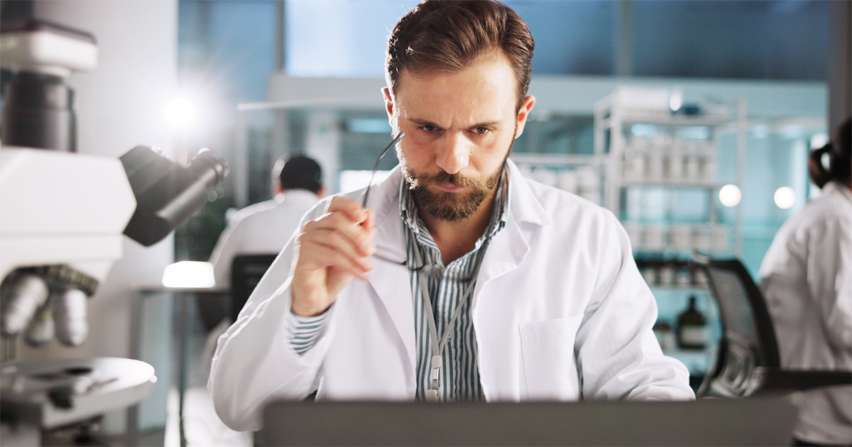 Can a Postdoc Qualify for EB-1A or NIW? Postdoctoral researcher reviewing publications, citations, and immigration evidence.