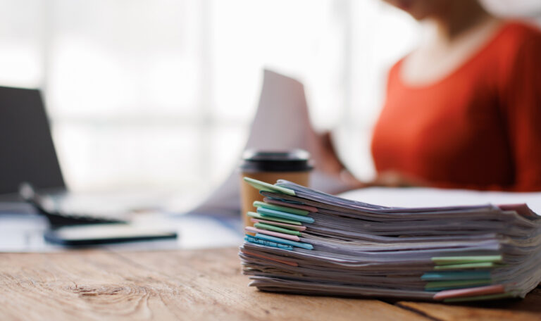 Researcher reviewing EB-1A citations evidence and scientific publications.