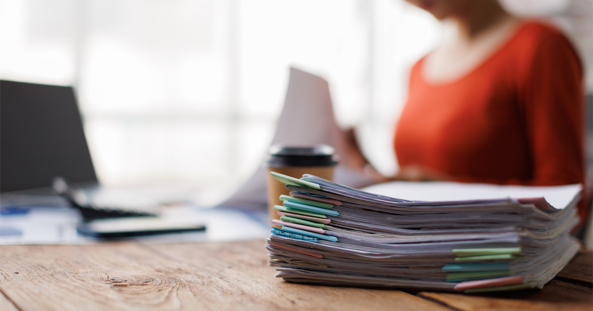 Researcher reviewing EB-1A citations evidence and scientific publications.