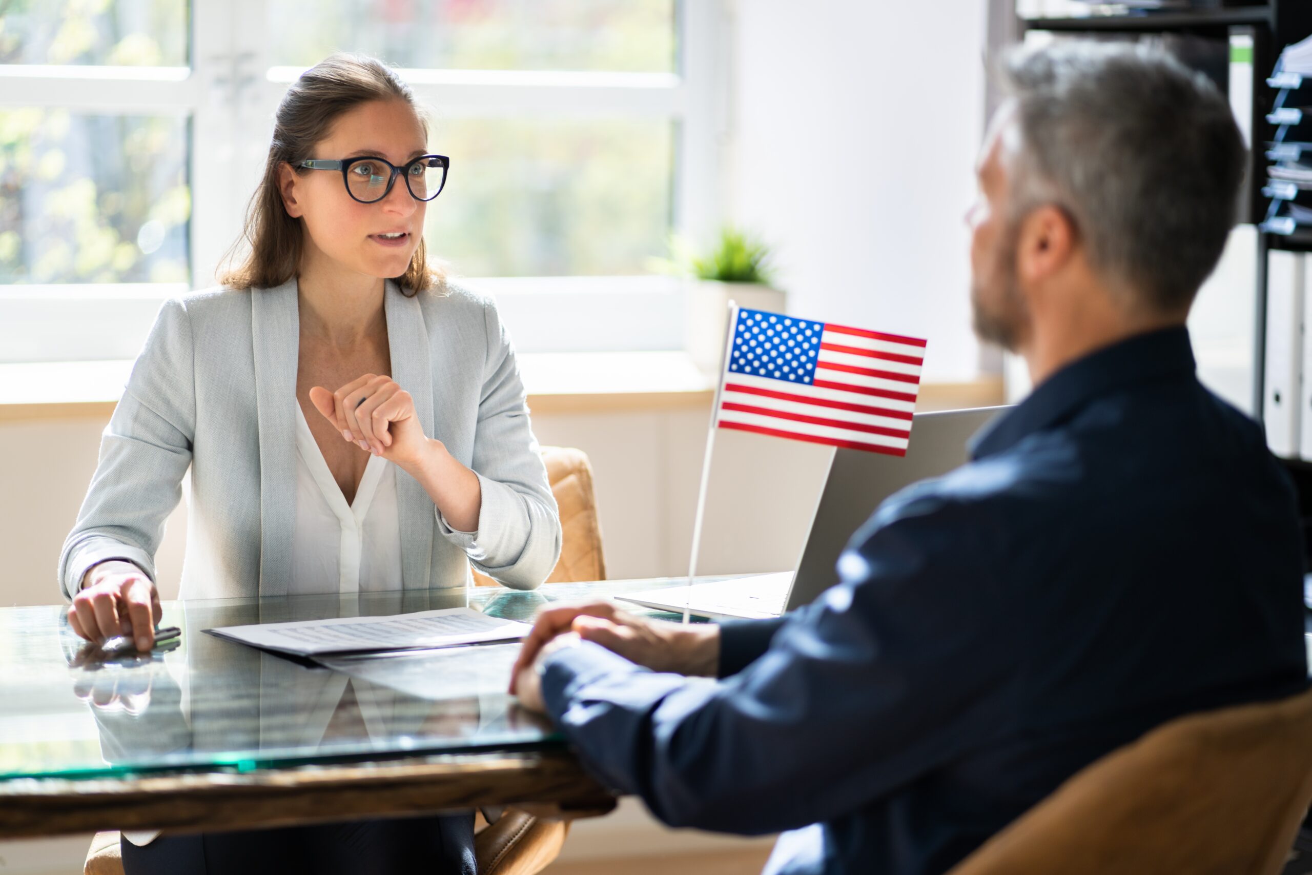 O-1 visa attorney for PhDs discussing petition strategy with a client